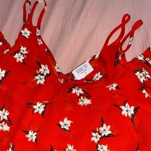 red women's blouse with white flowers